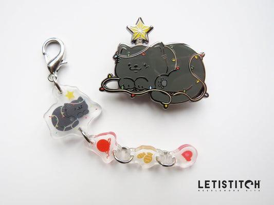 Cat-themed keychain and needleminder with 'Letistitch' branding on a white background