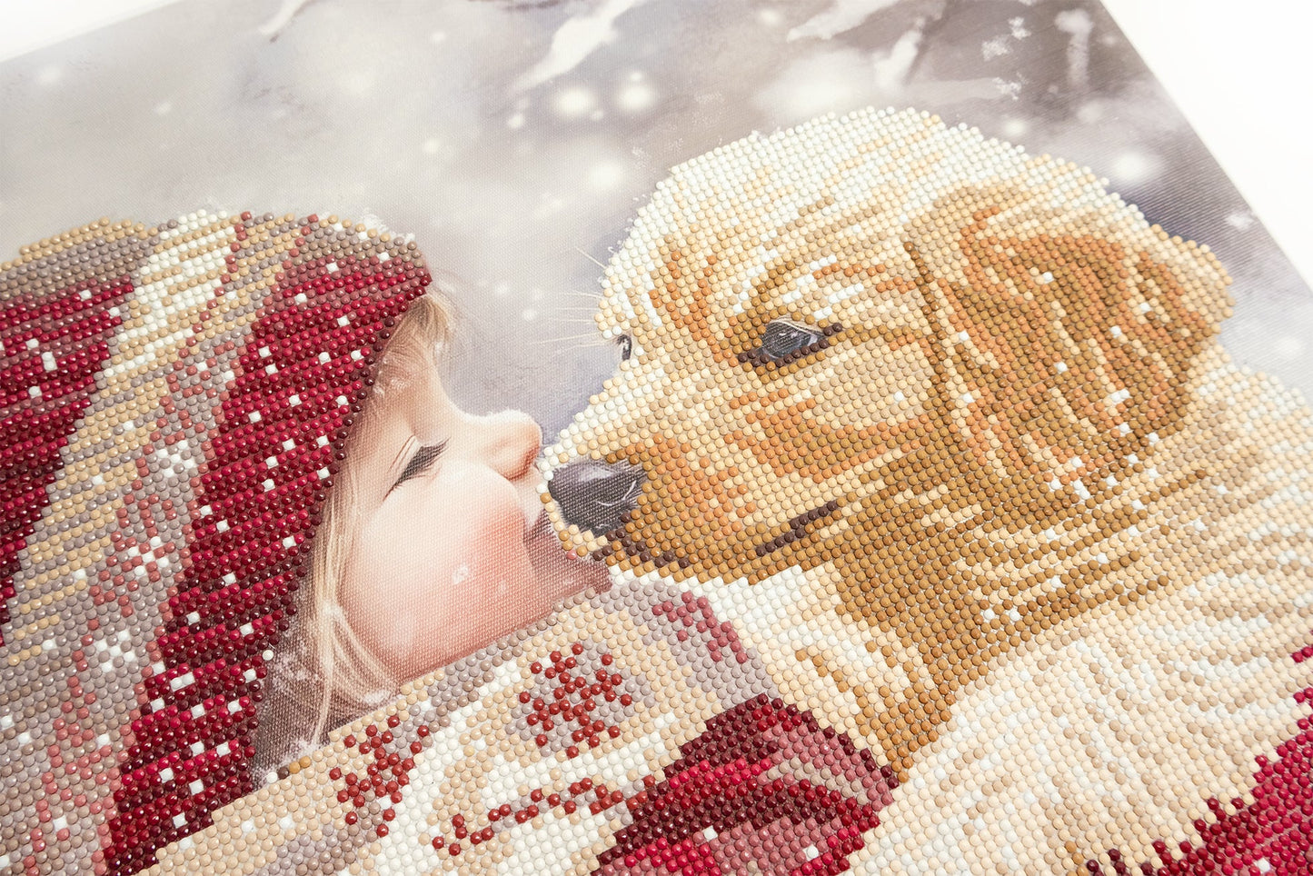 Crystal Art design of a child and a dog, resembling a Christmas scene.