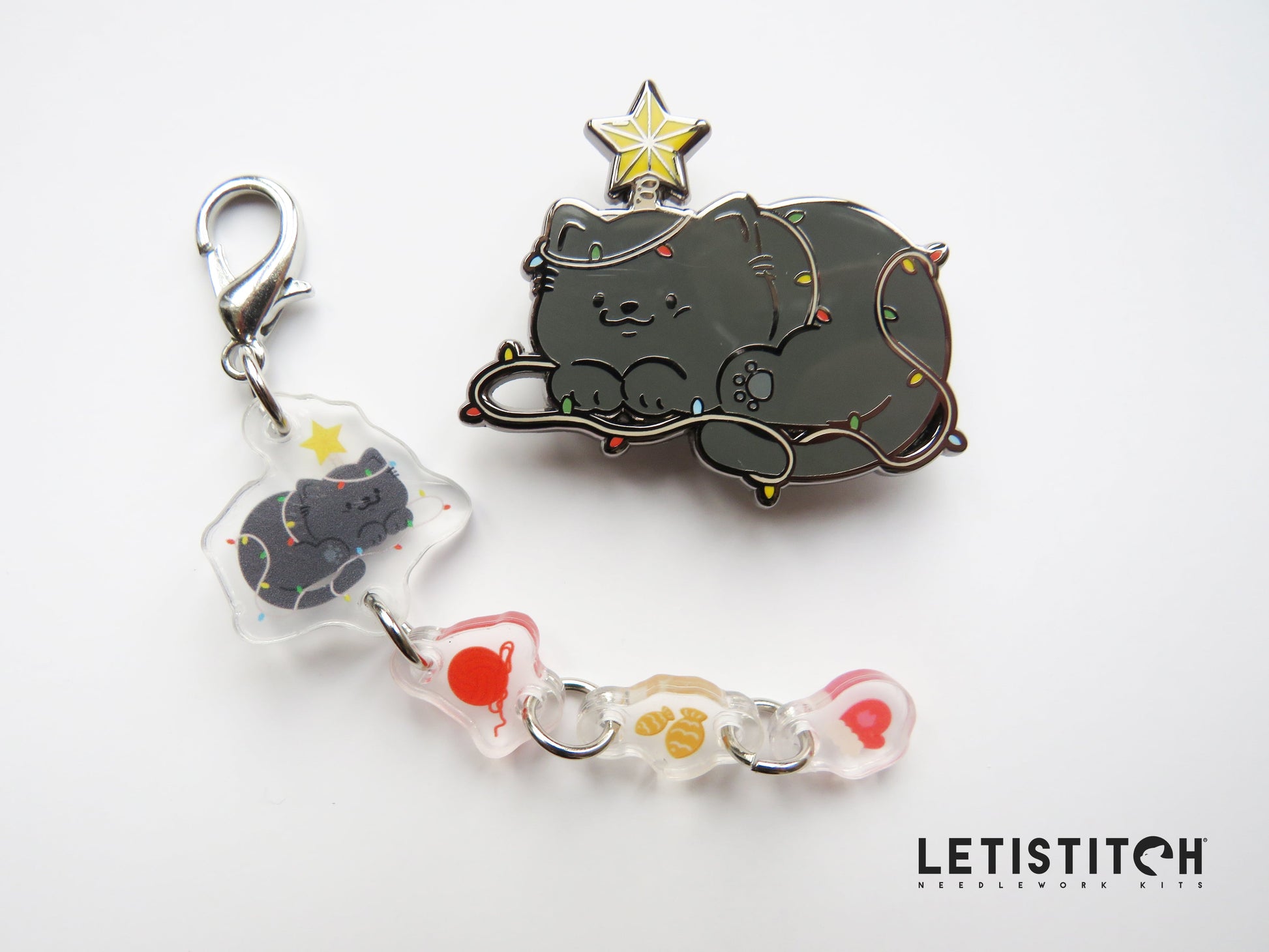 Cat-themed keychain and  needleminder with 'Letistitch' branding on a white background