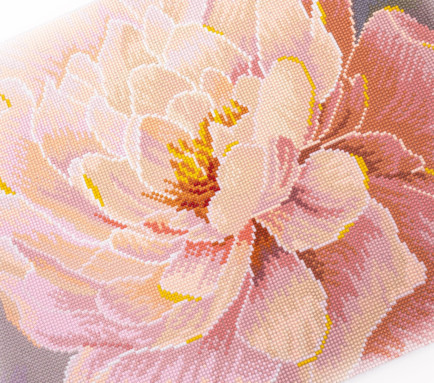 crystal art, diamond painting Close-up of a pink flower with detailed petals and center.