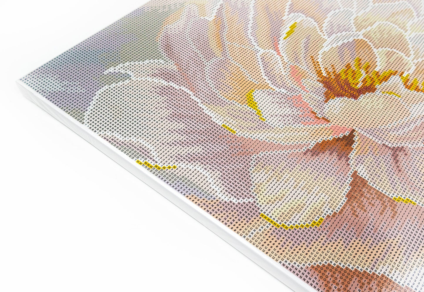 Partial view of a diamond painting with a floral design on a white background