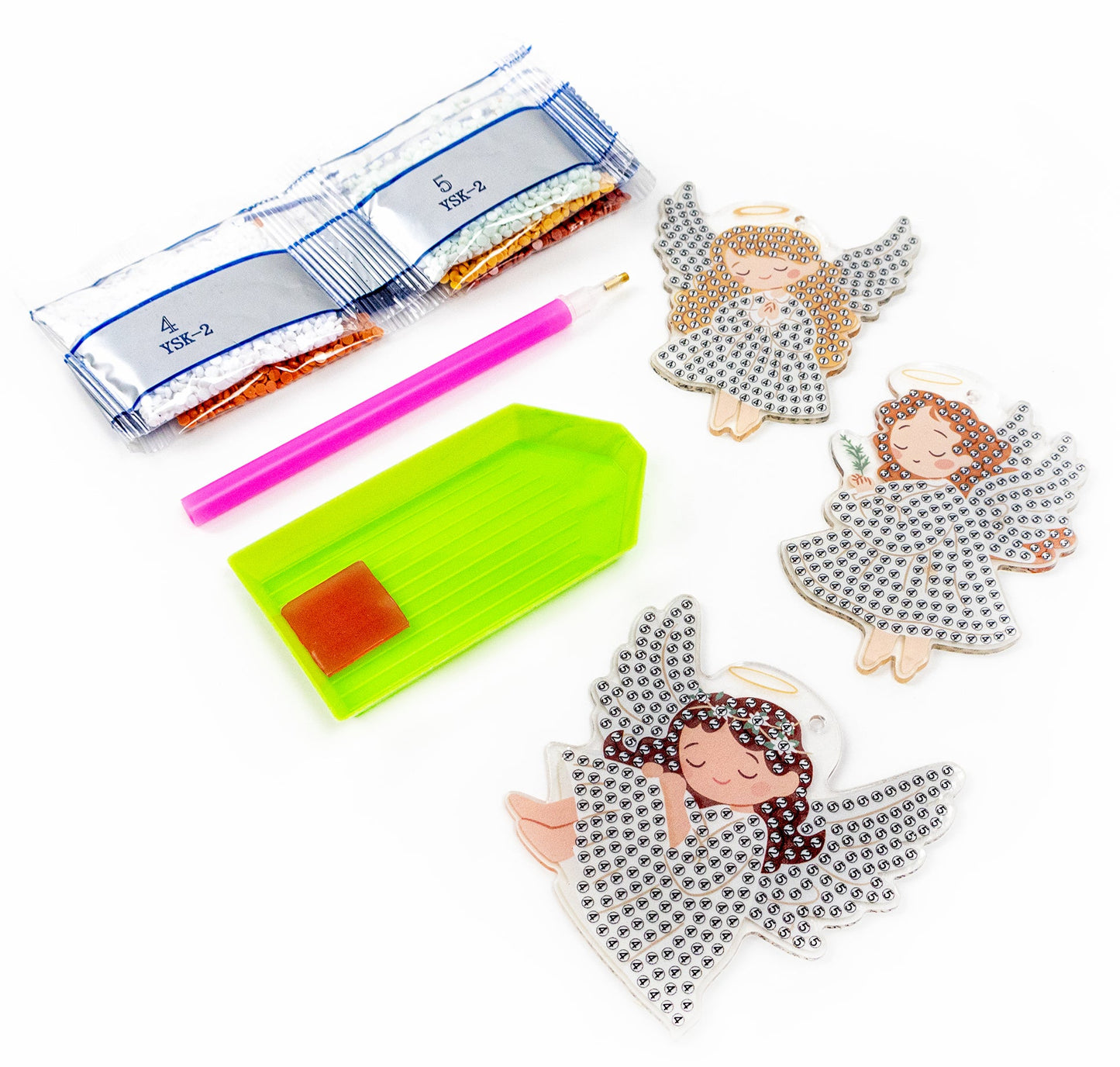 Dazzle Dots Diamond Art kit  Decorative angel figurines with tools on a white background