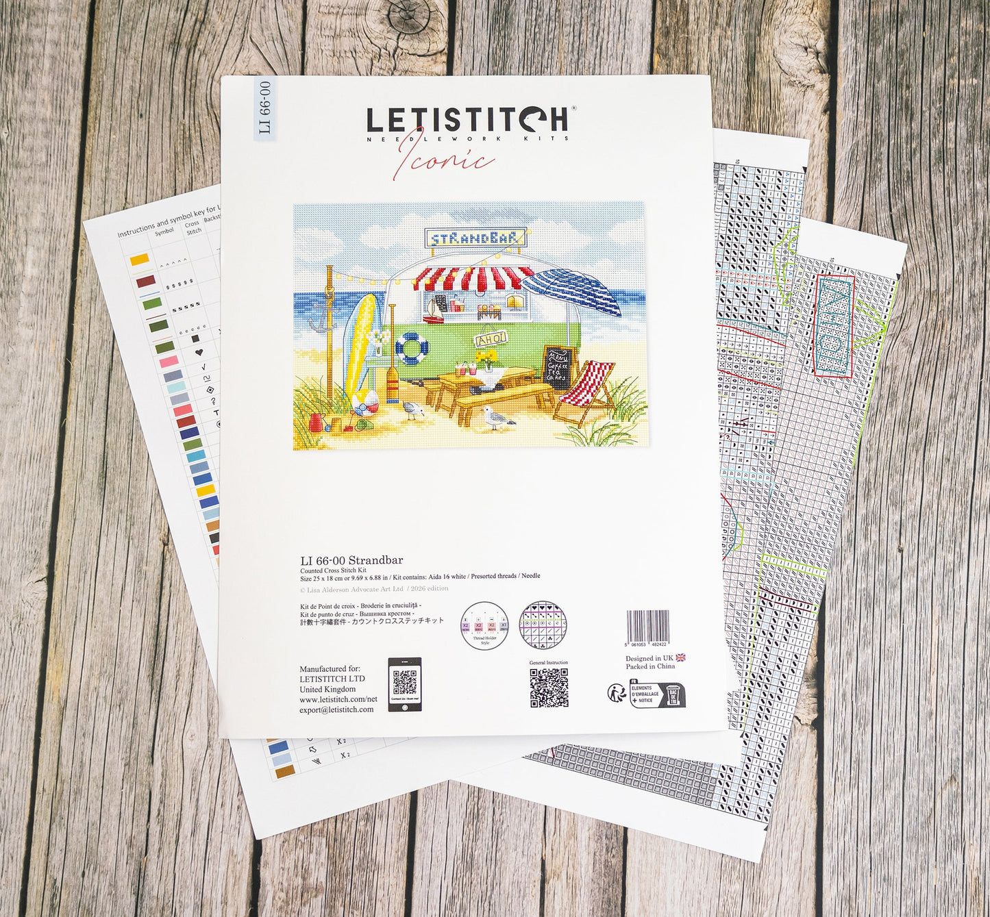 Letistitch embroidery design sheet on a wooden surface