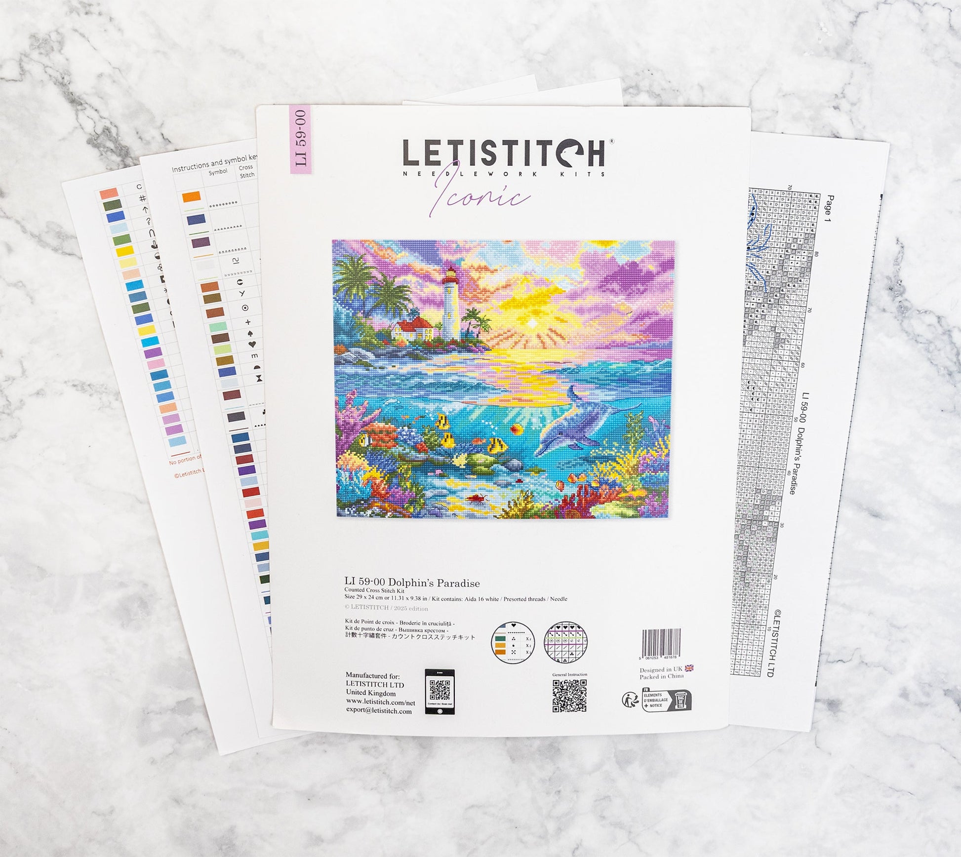 Letistitch embroidery kit with a colorful design of a lighthouse and ocean on a marble surface