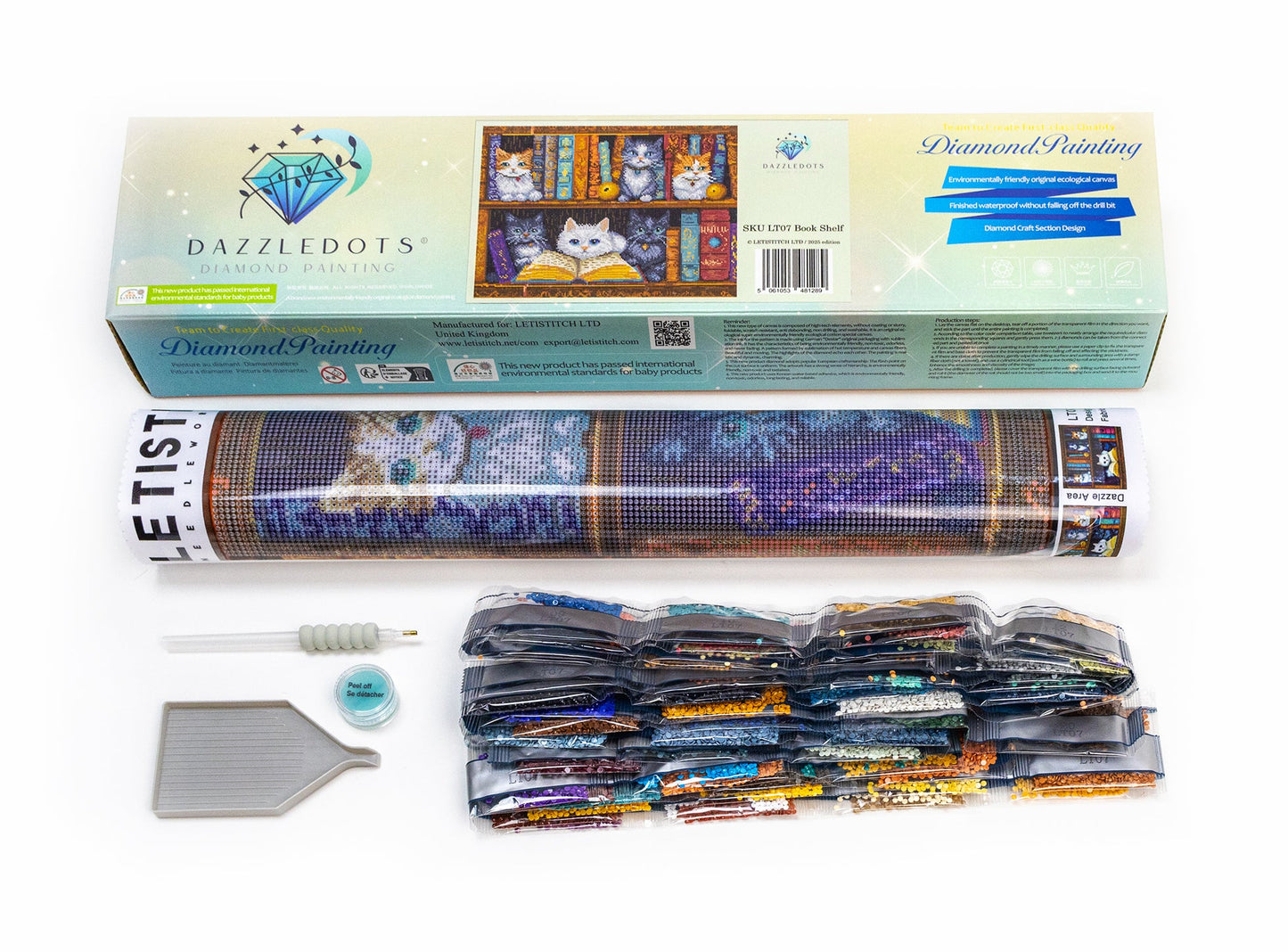 Diamond painting kit with packaging and tools on a white background