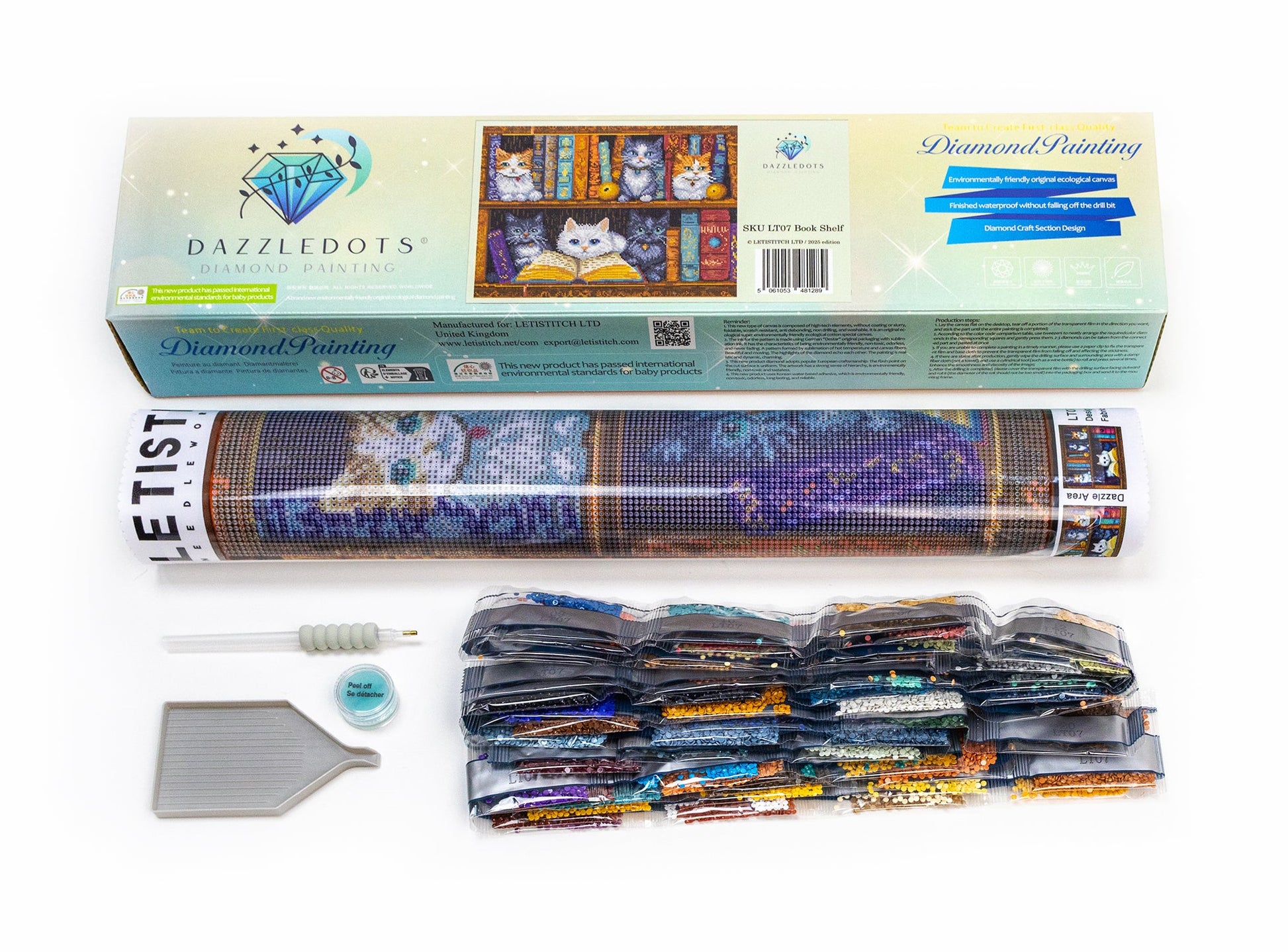 Diamond painting kit with packaging and tools on a white background