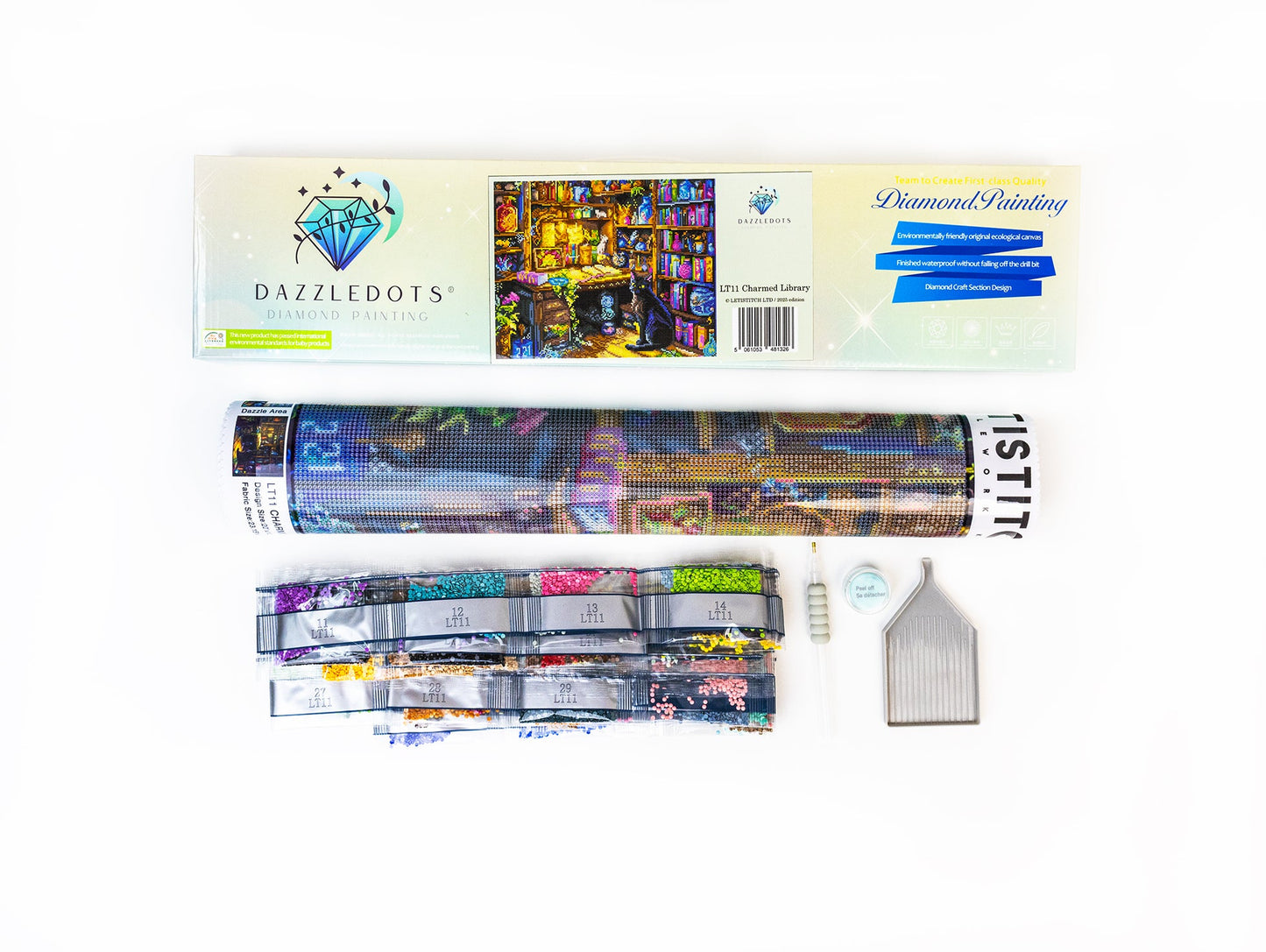 Diamond painting kit with packaging and tools on a white background