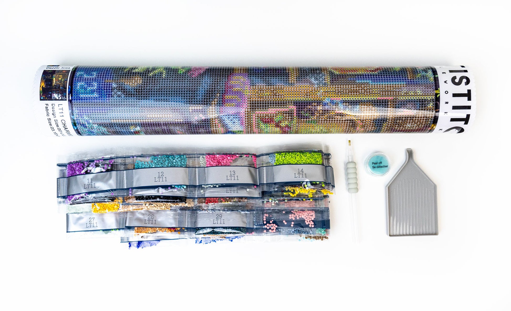 Roll of Diamond art kit with tools on a white background